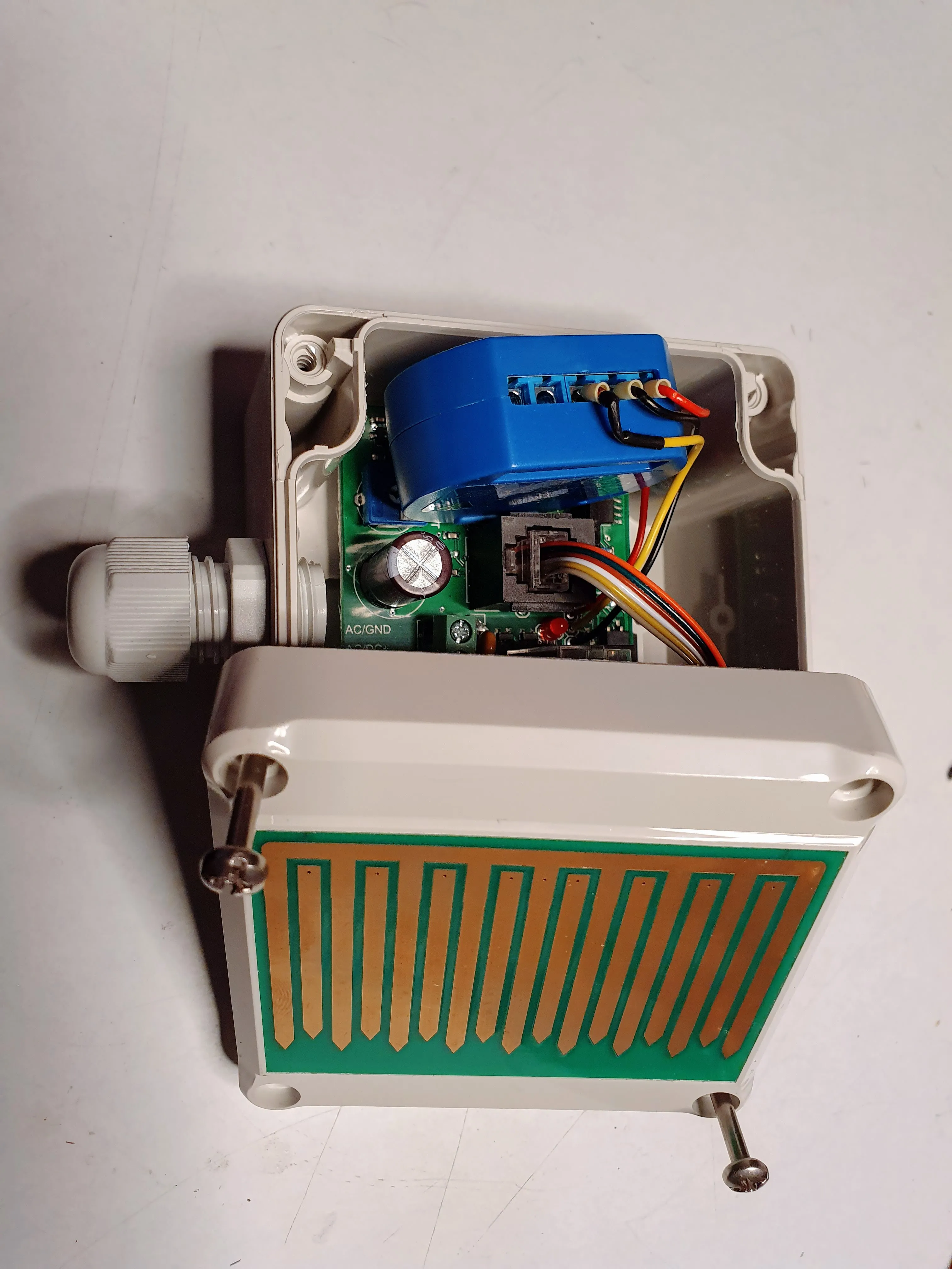 Rain sensor modified with a Shelly 1