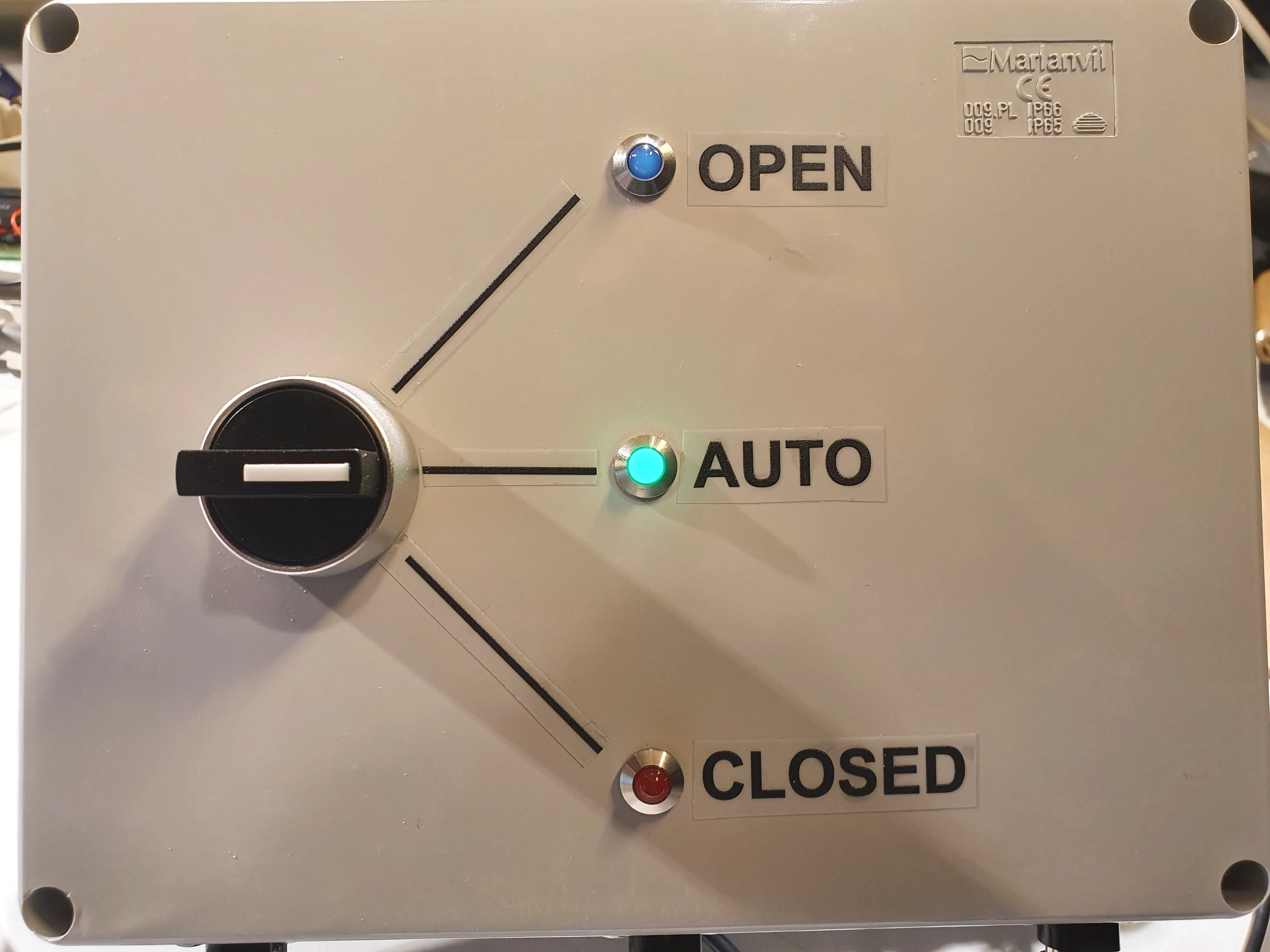 Manual override switch at the front of the water control box.